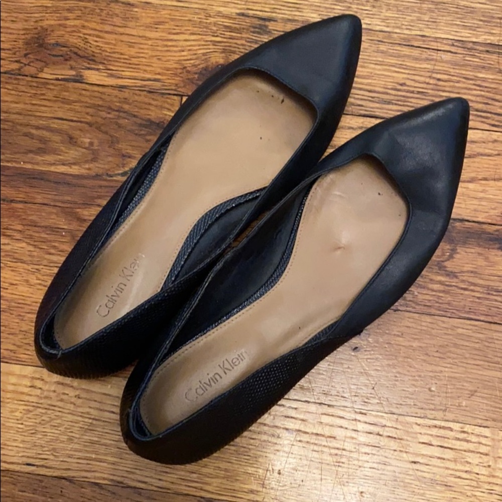 Calvin Klein black leather flats